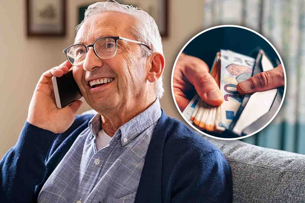 uomo al telefono e banconote in mano